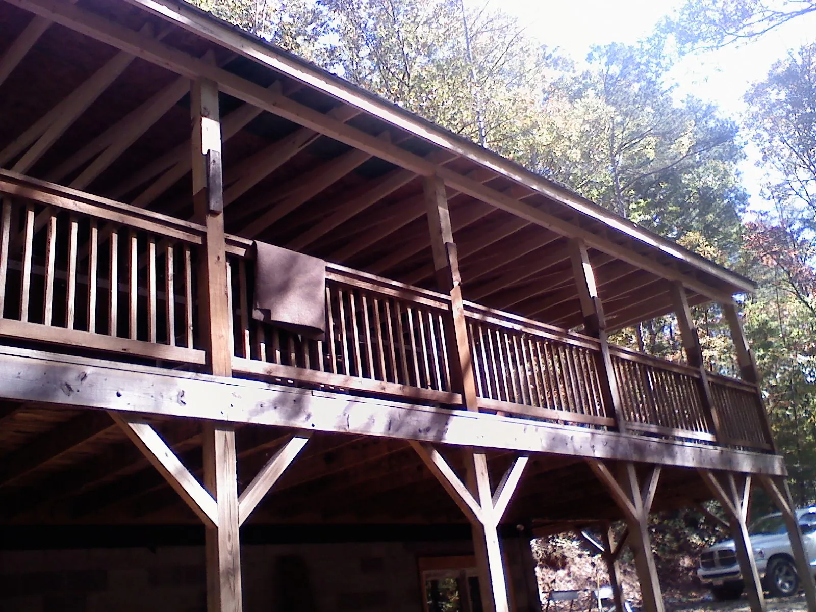 Timber framing under a new elevated porch and deck — Roof Leak Repair in Siletz by Roofing Brothers